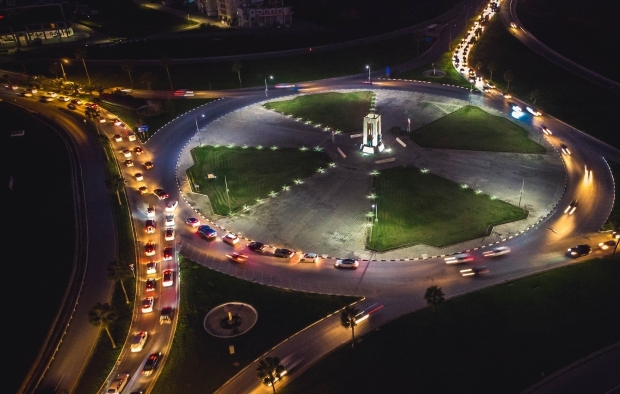 Traffic at a roundabout at night