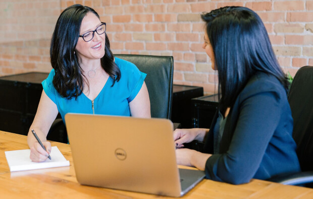 Two people discussing a Will