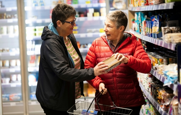 Two ladies out shopping in the supermarket