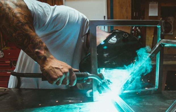 A man at work welding