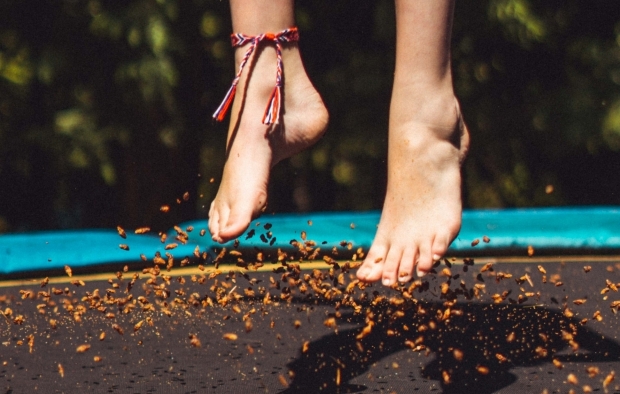 A person jumping on a trampoline