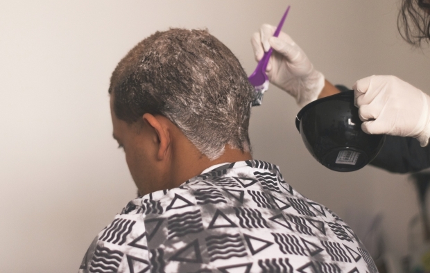 A person getting their hair dyed