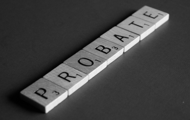The word probate is spelled out using scrabble tiles