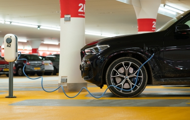 An electric vehicle is charging