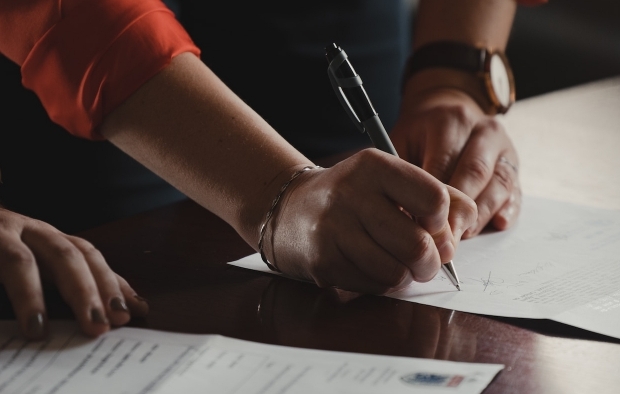 A person signing a legal document