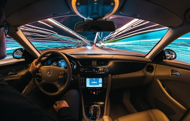A person driving a car